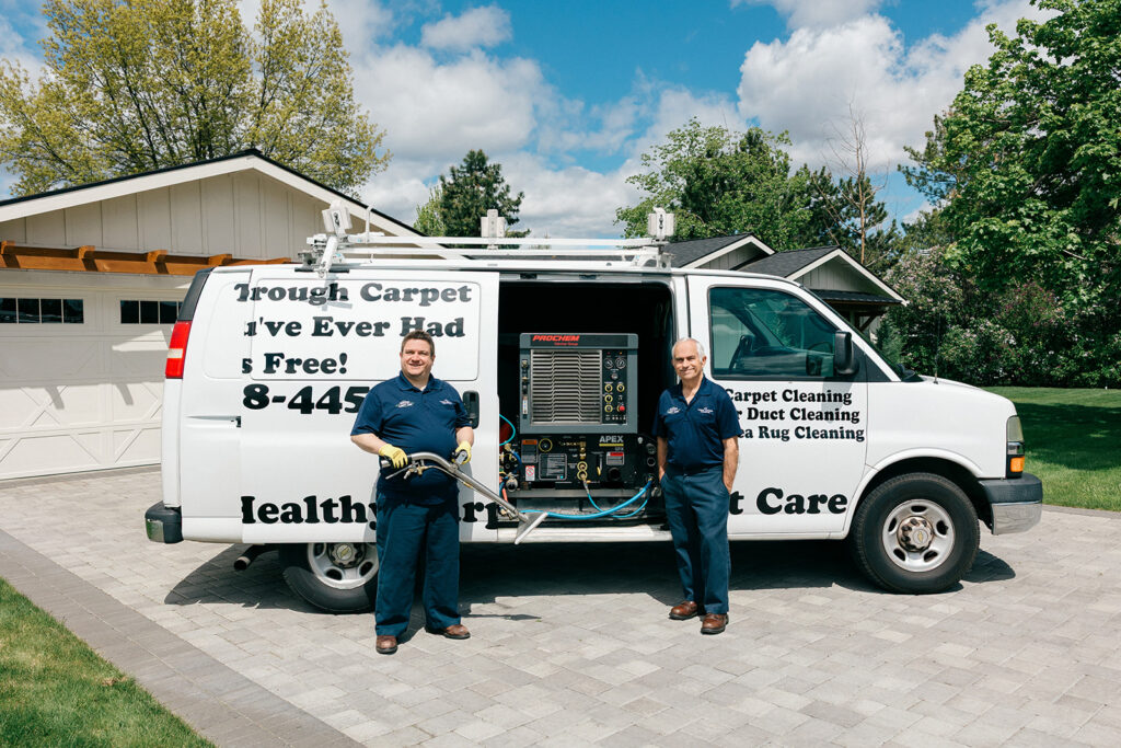 Local carpet cleaning professionals with truck-mounted equipment providing residential carpet cleaning service.