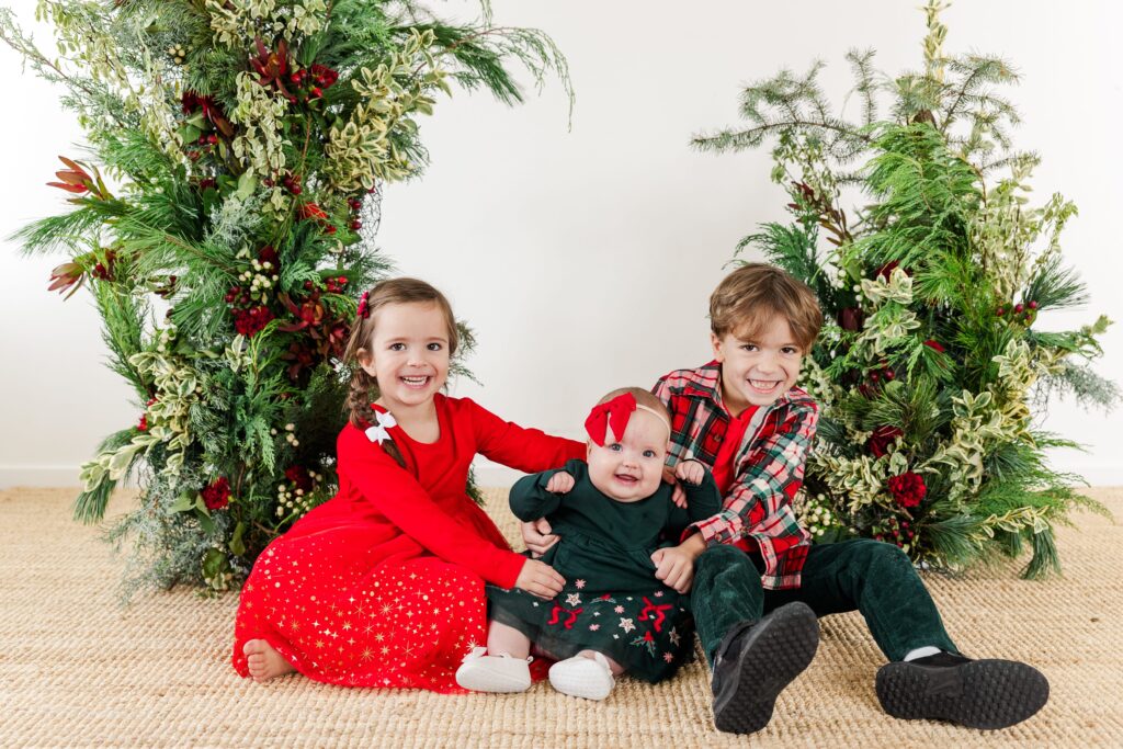 Kids in a holiday greenery session