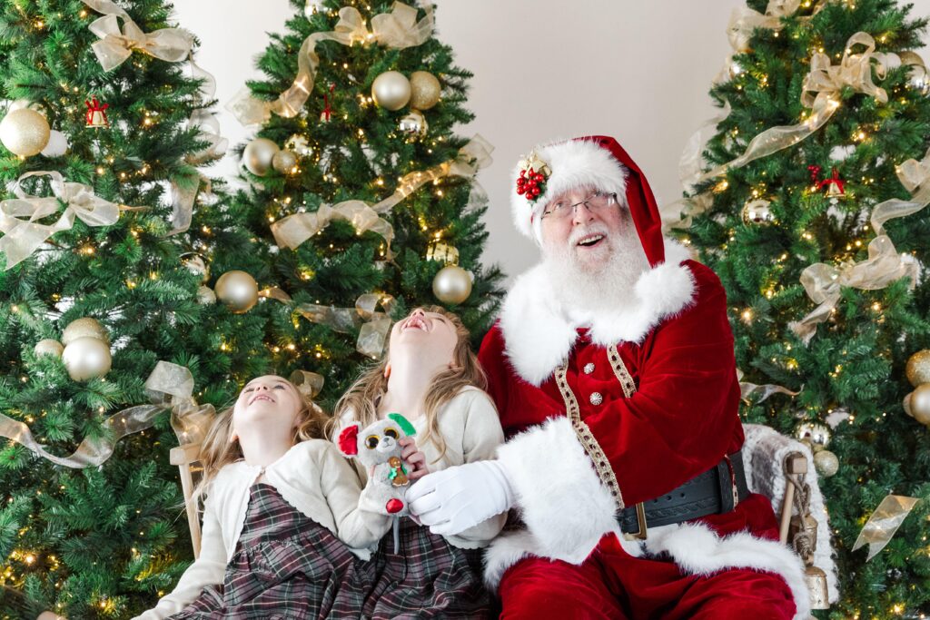 Children with Santa during a Holiday Kids Portrait session.”