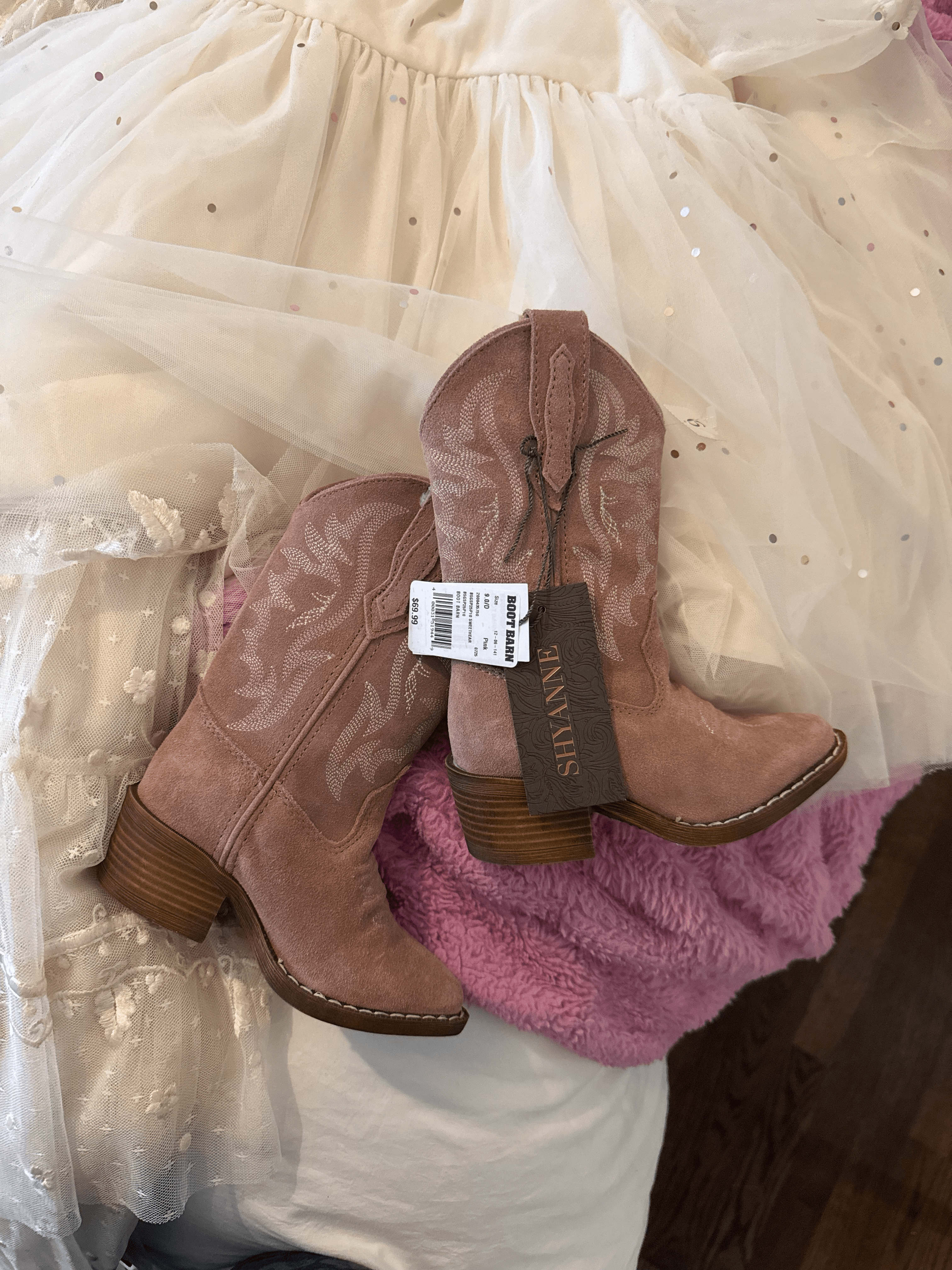 Pink Shyanne boots worn by the girls completing their playful outdoor look.