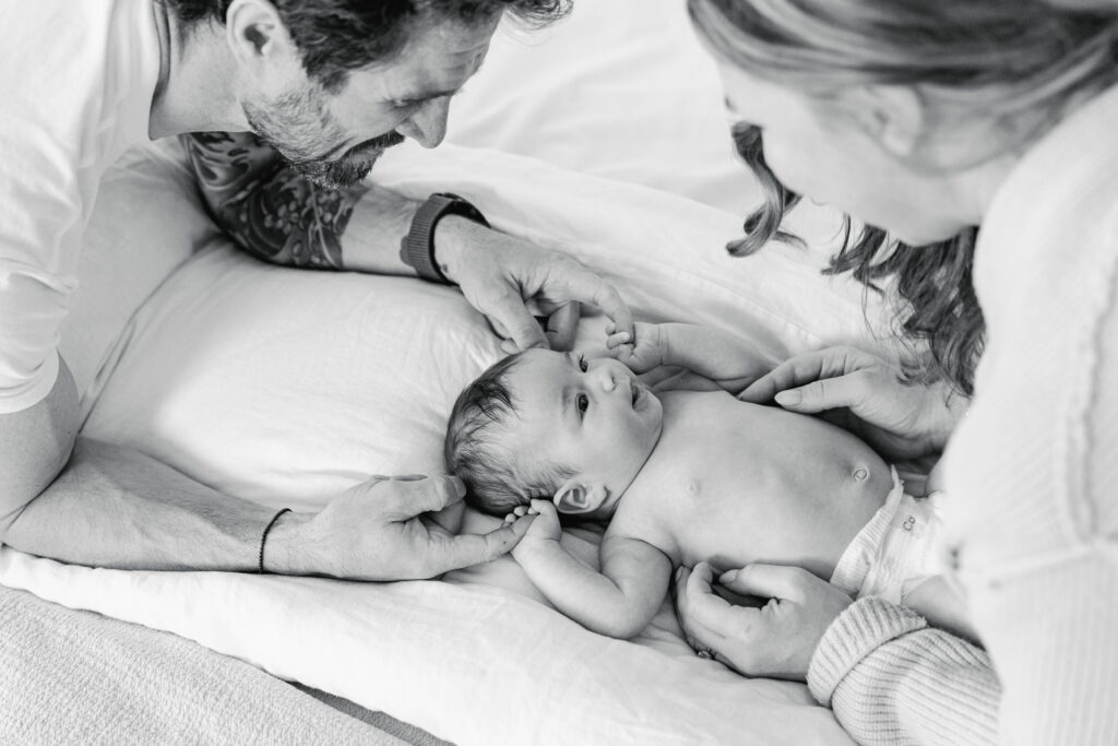 Parents holding their newborn