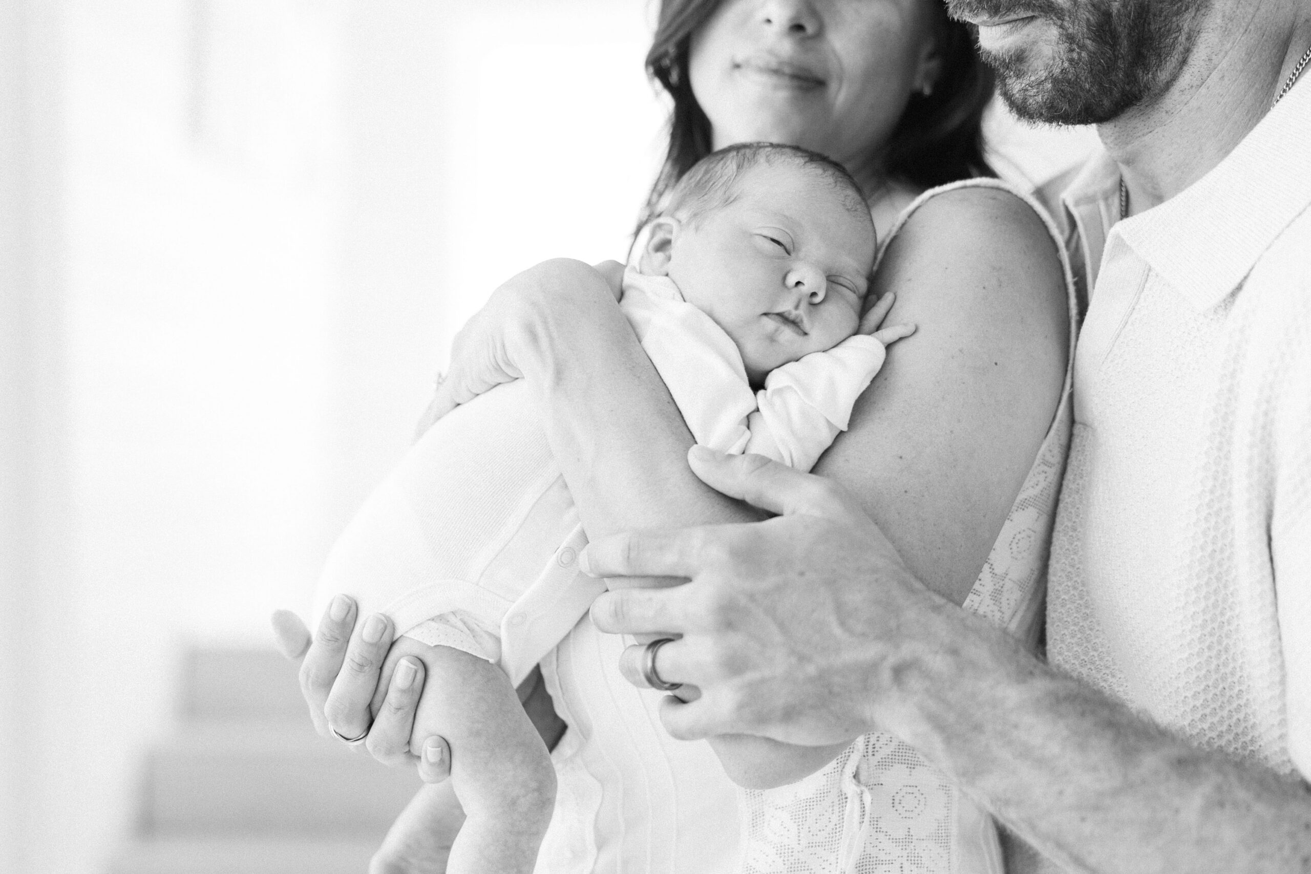 A family in a newborn photography session in Bend, Oregon.